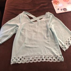 Day trip see thru cross back top